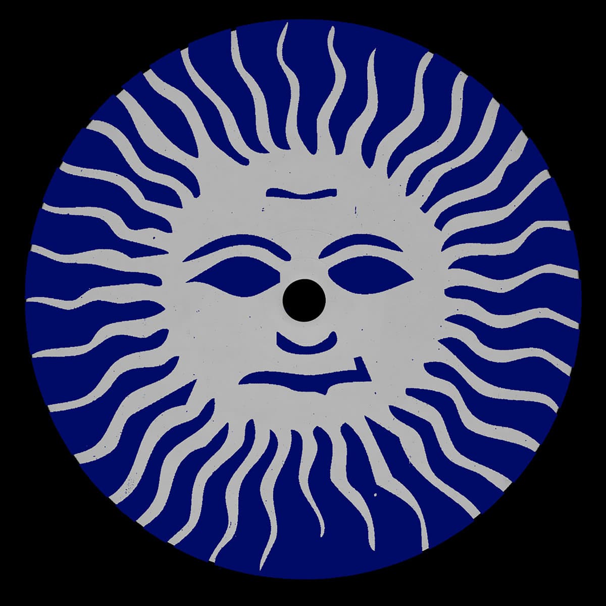 Circular design with a face-like face in blue and white on a black background