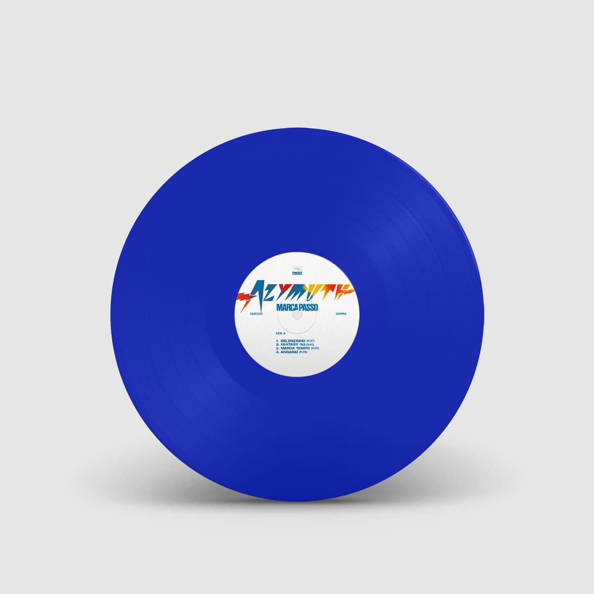 Blue vinyl record with a white label on a gray background