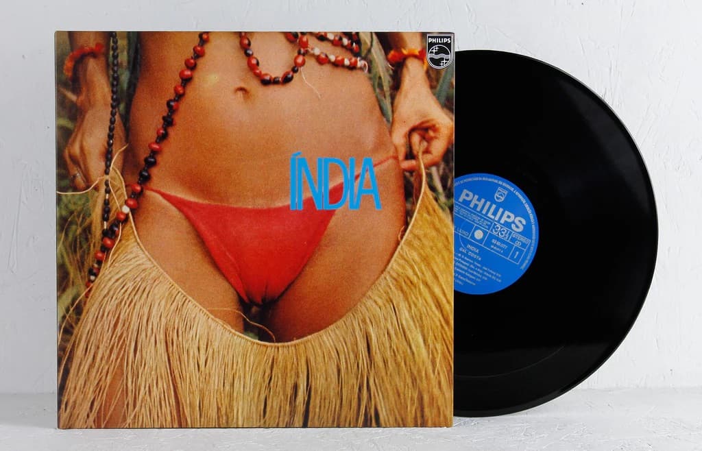 Vinyl record with a cover featuring a person in a bikini and the word 'India'.