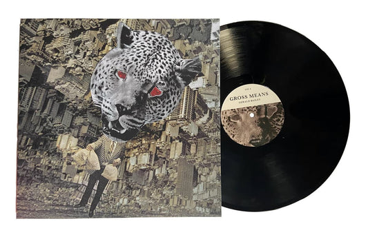 Vinyl record with a leopard design on the cover and a cityscape background