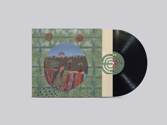 Vinyl record for Go Kurosawa - soft shakes with a colorful cover on a gray background