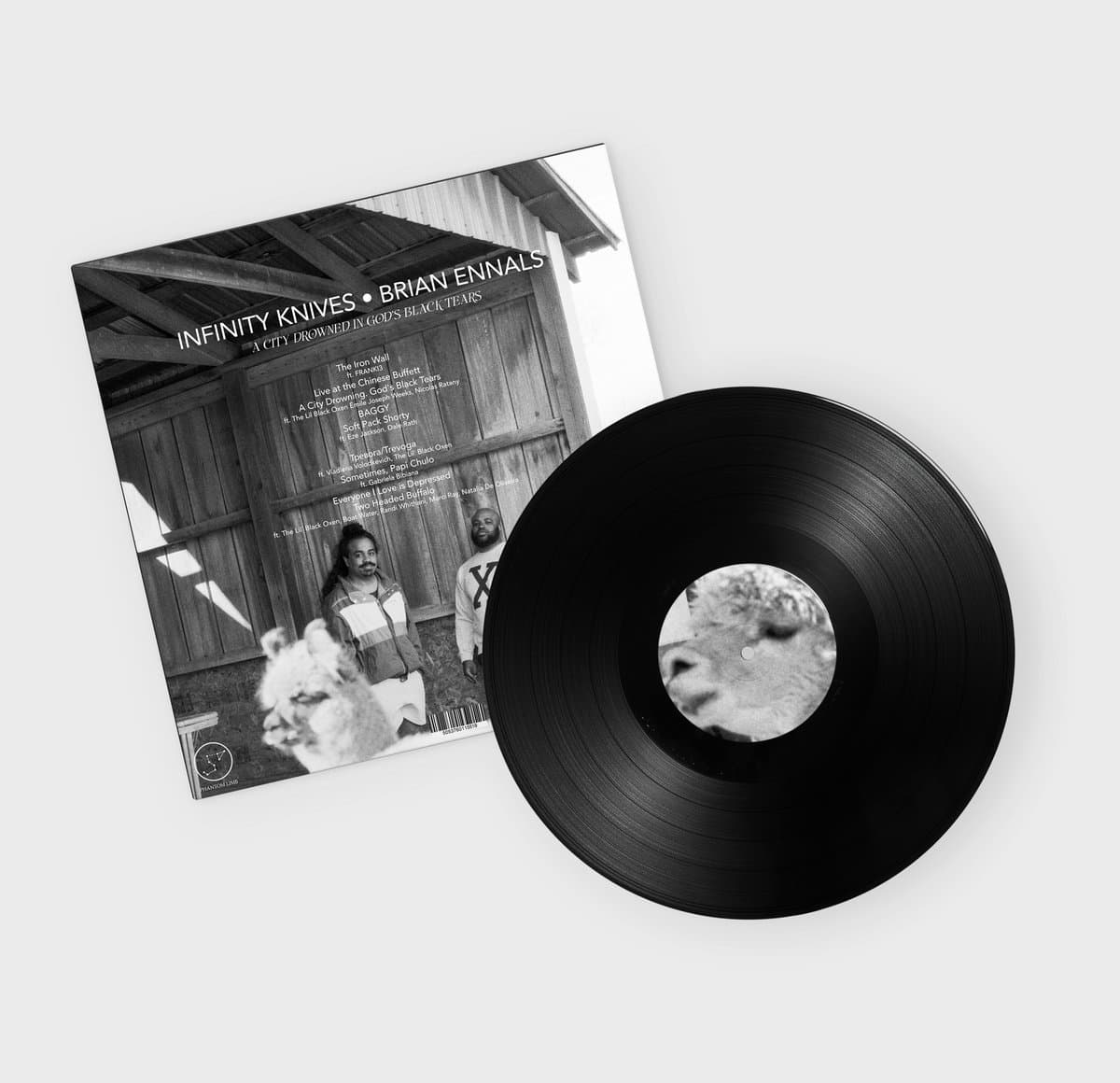 Vinyl record and cover with 'Infinity Knives' by Brian Ennals and Infinity Knives on a white background