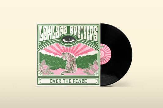 Vinyl record with a colorful cover featuring an eye and nature-themed design on a beige background.
