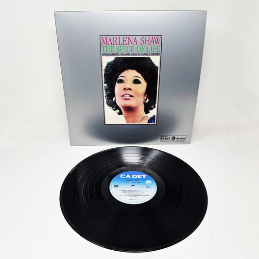 Vinyl record with cover featuring Marlena Shaw on a white background