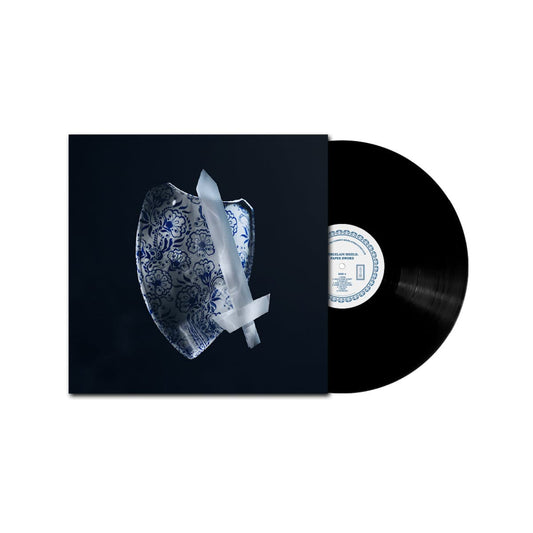 Front vinyl record for "Porcelain Shield, Paper Sword" by Mary Sue and the Clementi Sound Appreciation Club with a decorative cover featuring a blue and white pattern.