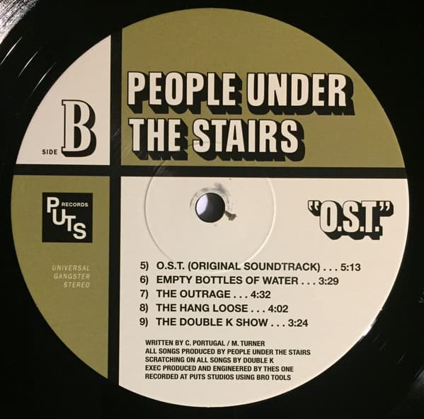 Vinyl record label for Side B of People Under the Stairs album OST with tracklist and branding.