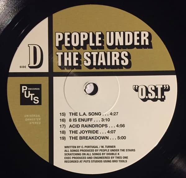 Vinyl record label for Side D of People Under the Stairs album OST with tracklist and branding.