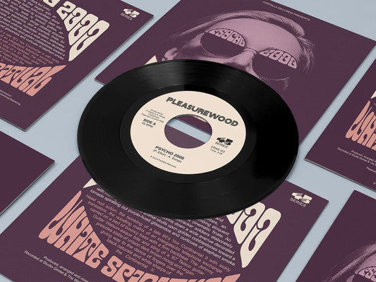 Vinyl record with 'Pleasurewood' on a purple background