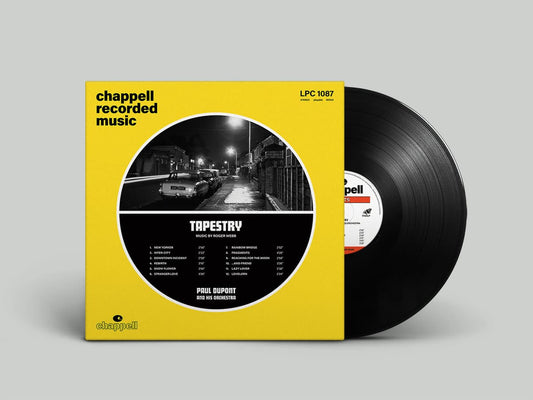 Vinyl record with yellow cover featuring a city street scene and album details.