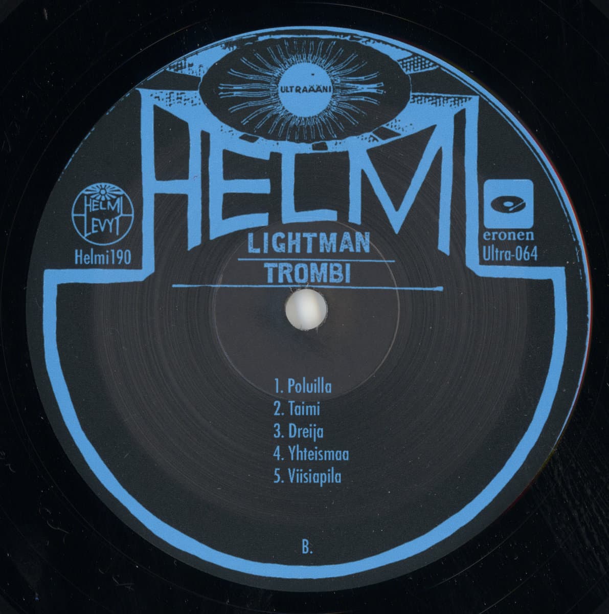 Vinyl record label with 'HELMI' and Lightman - Trombi branding and tracklist on a black background