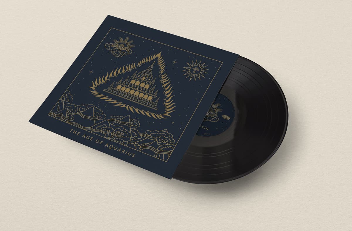 Vinyl record with a blue cover featuring gold illustrations on a beige background