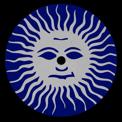 Circular design with a face-like face in blue and white on a black background