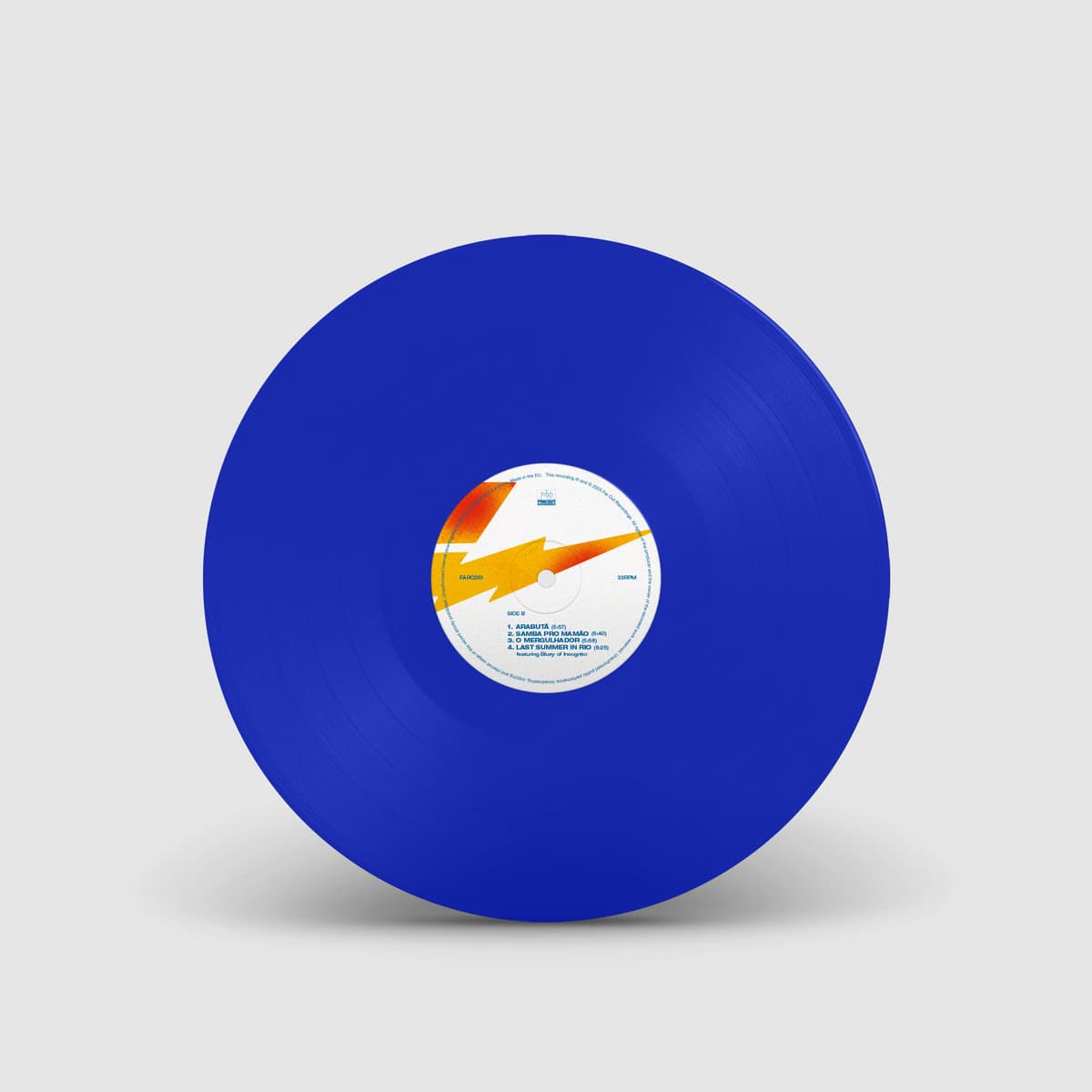 Blue vinyl record with a white label on a light gray background