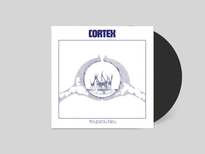 Vinyl record with a white cover featuring 'Cortex' and 'Toupeau Bleu' on a gray background