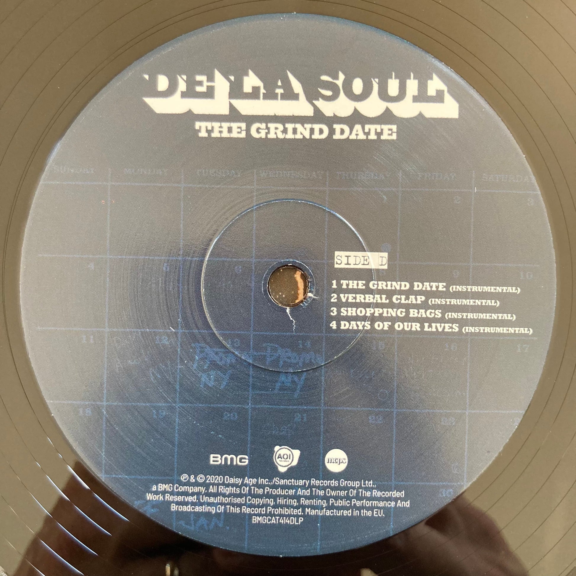 Vinyl label, side D, of De La Soul’s The Grind Date
