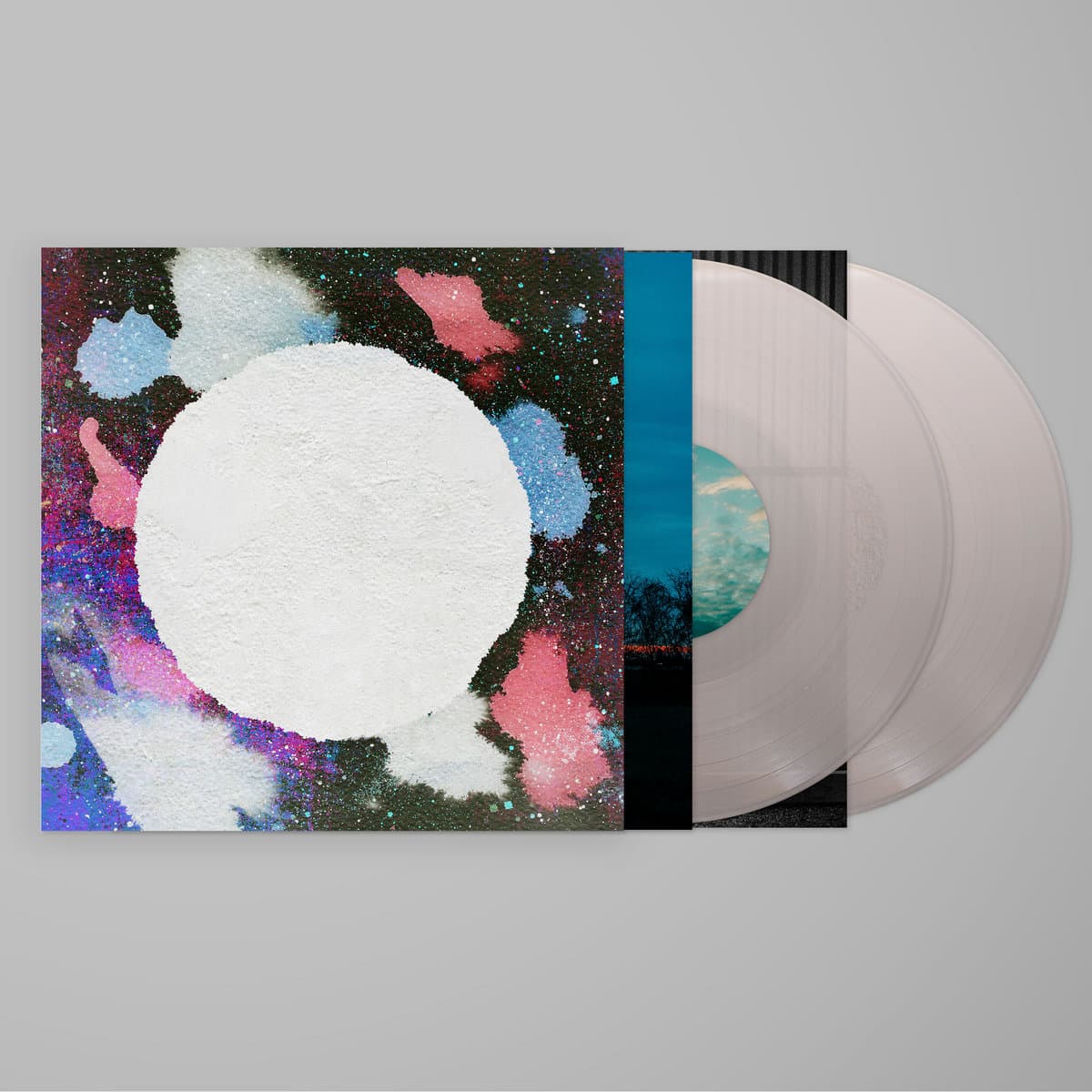 Translucent white vinyl and sleeve/art for for Khruangbin - The Universe Smiles Upon You ii, against a grey background
