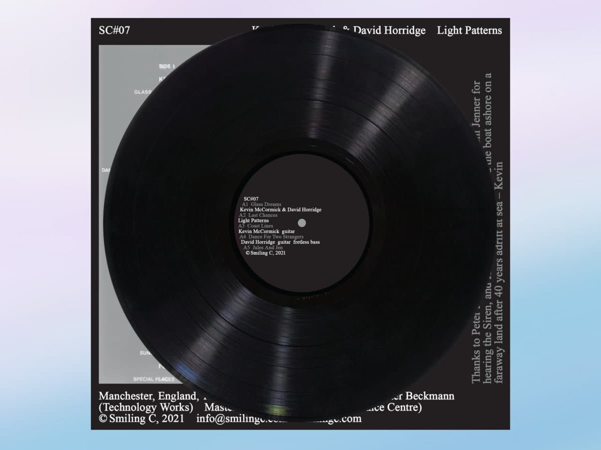 Vinyl record with text on a gradient background