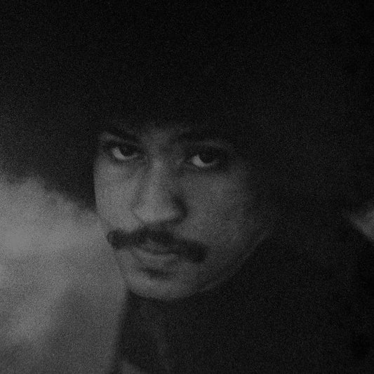 Front cover of Nyron Higor LP featuring a close up black and white photo of Nyron