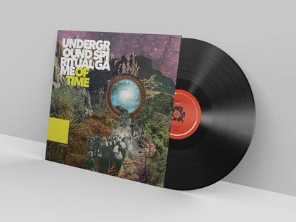 Vinyl record with a colorful album cover on a white background