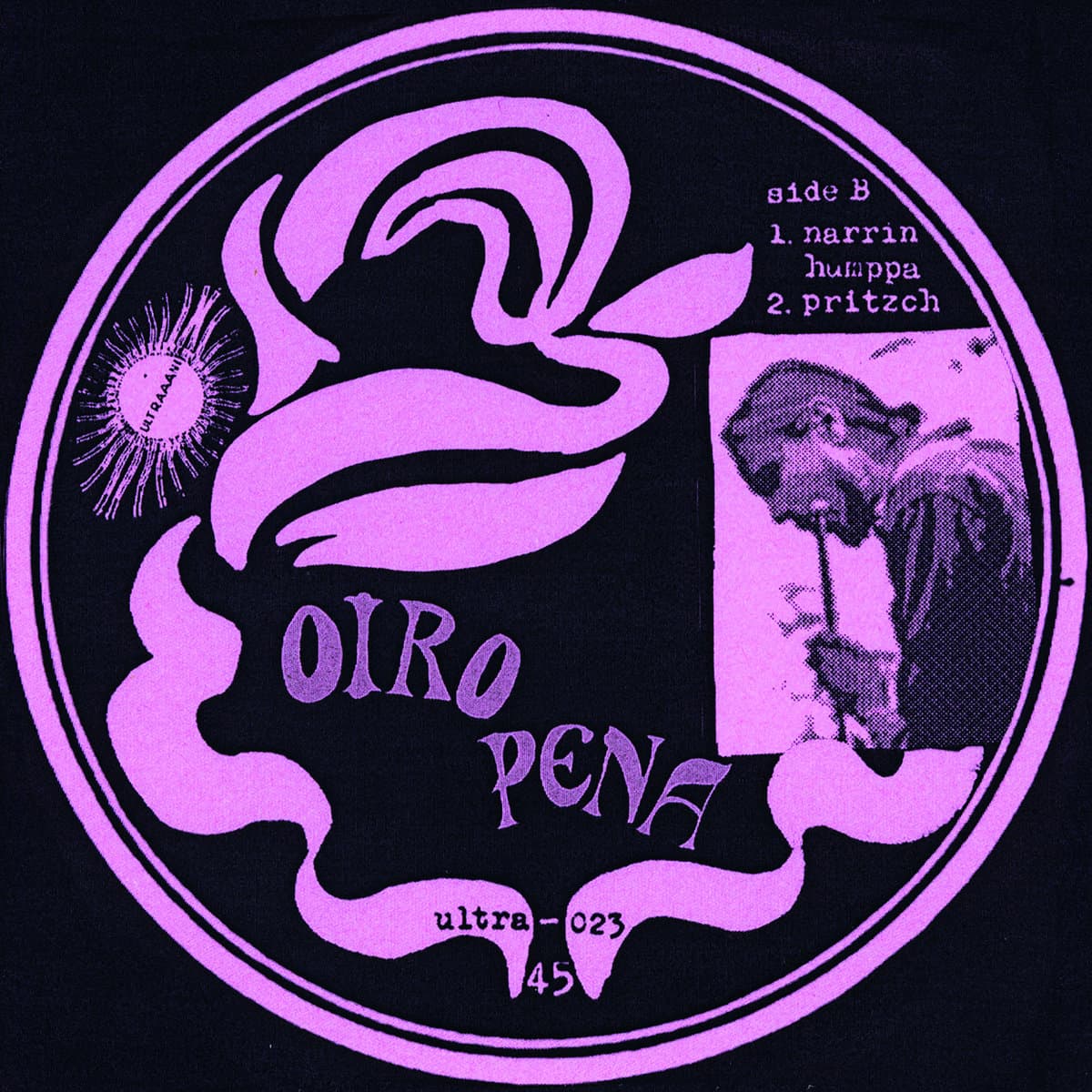 Vinyl record label with pink design and text on a black background