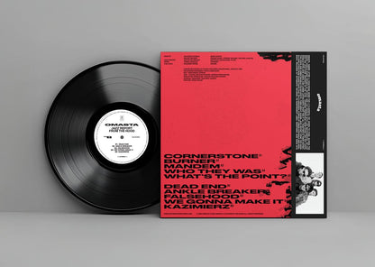 Vinyl record with a red cover on a gray background