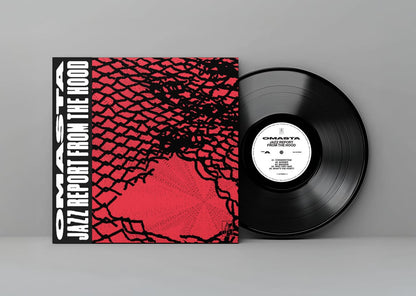 Vinyl record with a red and black cover on a gray background