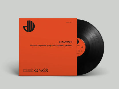Vinyl record with orange cover and black disc on a gray background