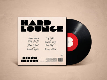 Vinyl record with 'Hard Lounge' album cover on a beige background