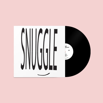 Vinyl record with 'SNUGGLE' text on a pink background
