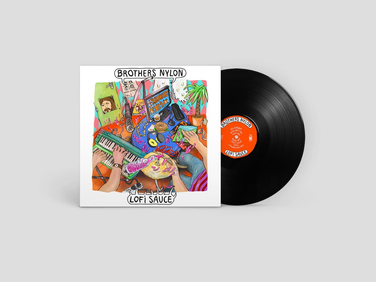Vinyl record and cover with colorful artwork on a light gray background