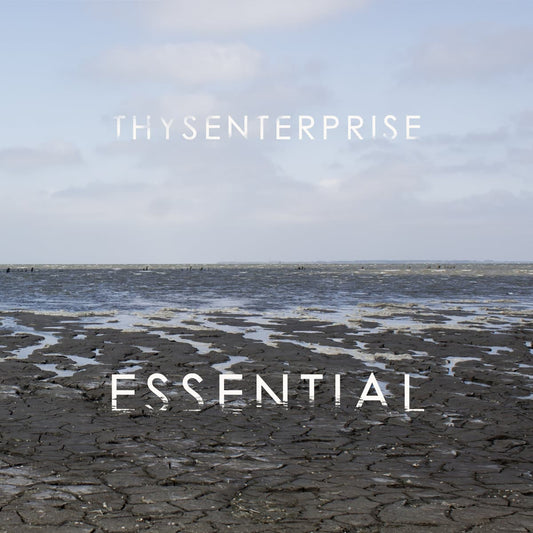 Cover art for Thysenterprise - Essential showing a muddy flatland with 'THYSENTERPRISE' and 'ESSENTIAL' text overlay