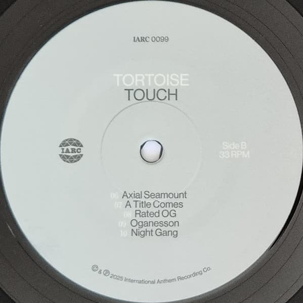 Vinyl label, side B, for Tortoise - Touch on black vinyl