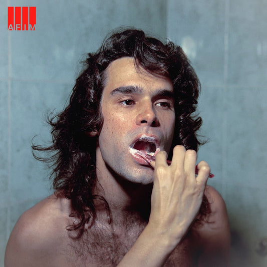 Cover for Ze Ibarra - AFIM featuring a long-haired man brushing his teeth against a turquoise background.