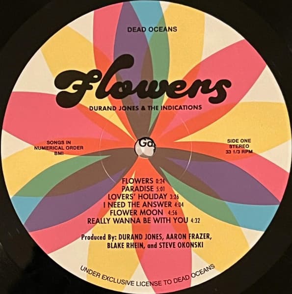 Colorful vinyl record label with text and tracklist for 'Flowers' by Durand Jones & The Indications.