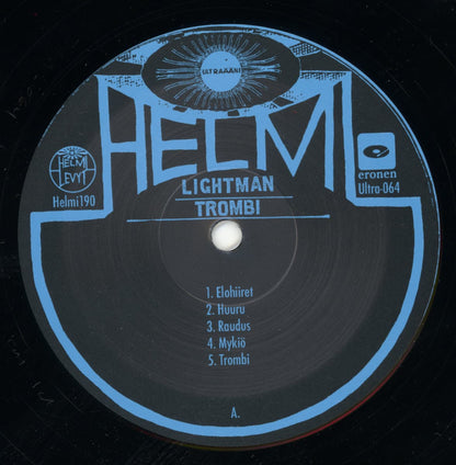 Vinyl record label with 'HELMI' and Lightman - Trombi branding and tracklist on a black background