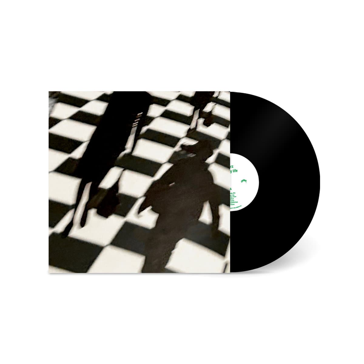 Vinyl record for Smerz - Big City Life with a black and white checkered pattern on the cover