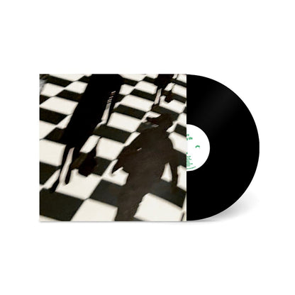 Vinyl record for Smerz - Big City Life with a black and white checkered pattern on the cover