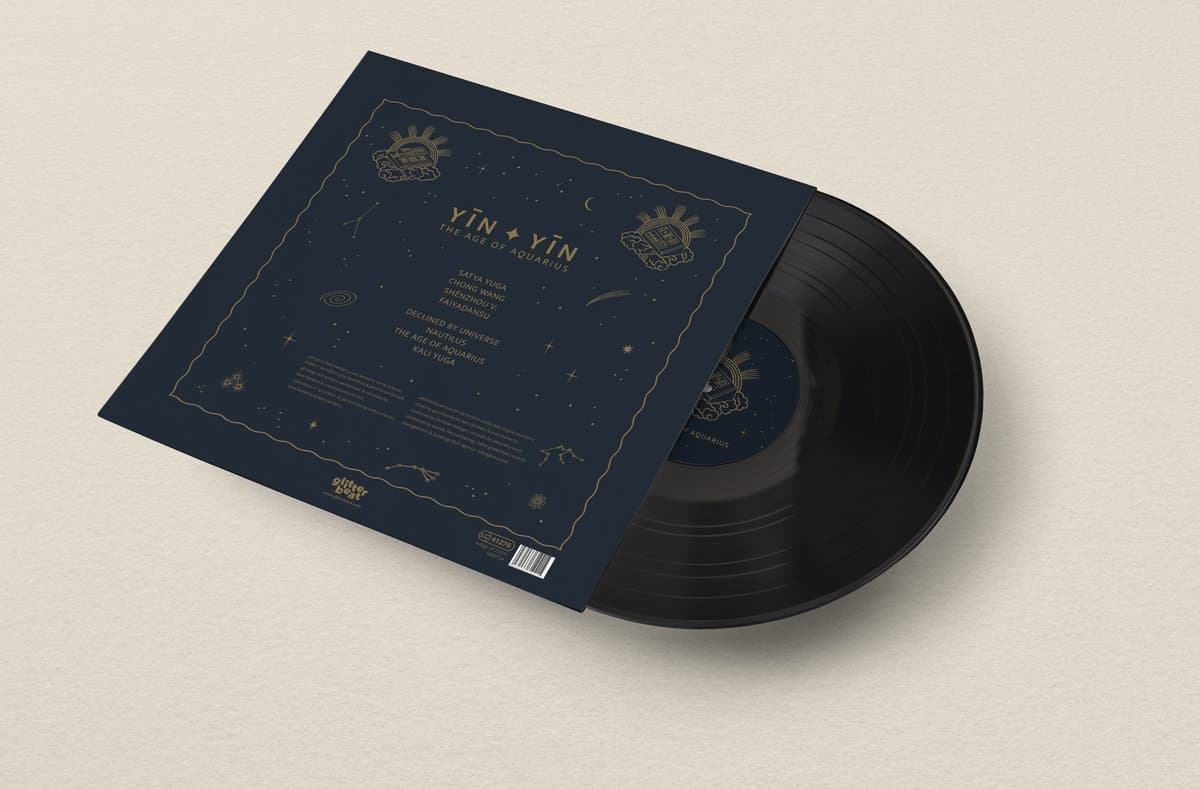 Vinyl record with its cover on a beige background