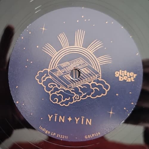 Vinyl record label with 'Yin Yin' lettering and 'glitterbeat' branding.